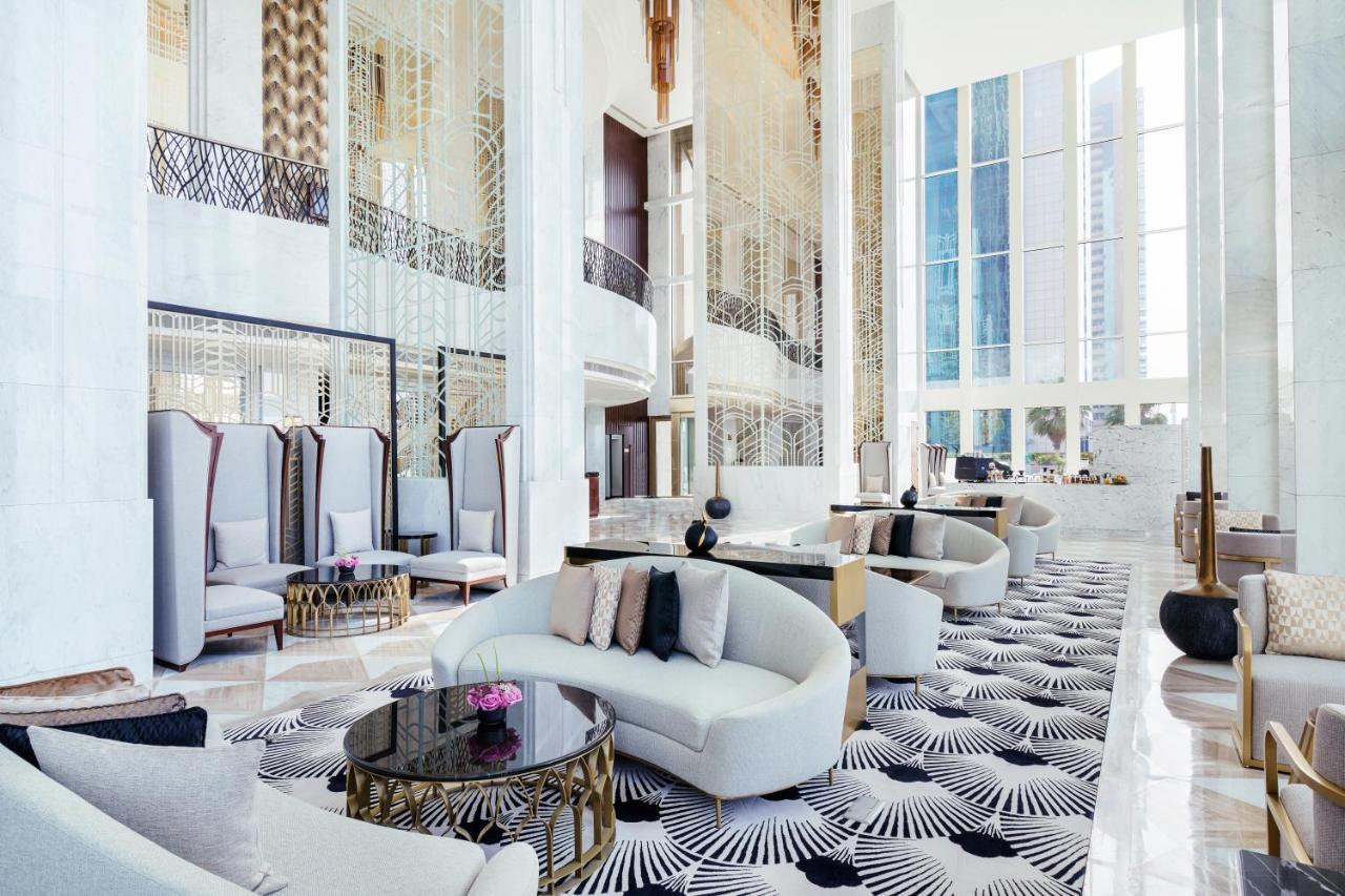 Wyndham Grand Doha West Bay Beach Exterior foto The lobby of the hotel